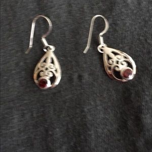 Sterling silver earrings with red stone.